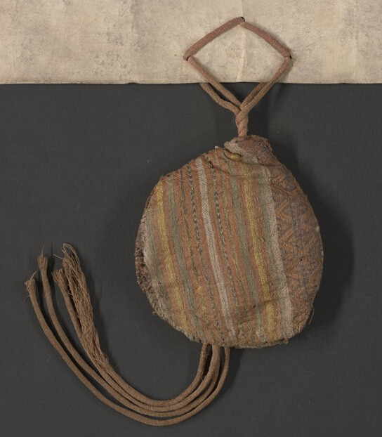 Back of the Holy Trinity pouch made of a multicoloured striped silk cloth of Arista.