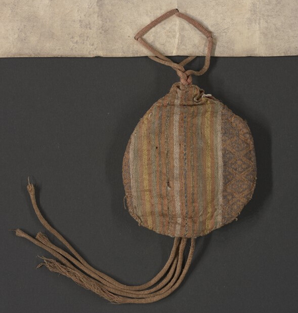 Front of the Holy Trinity pouch made of a multicoloured striped silk cloth of Arista.